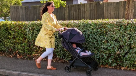 Joie Porto travel stroller being pushed
